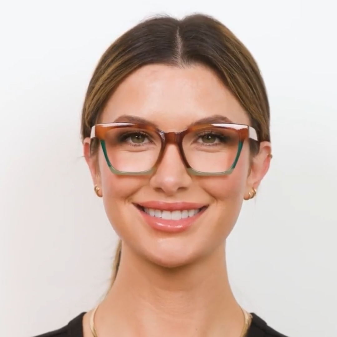 Woman wearing Peepers Birdie blue light reading glasses in Blonde Tortoise Colorblock
