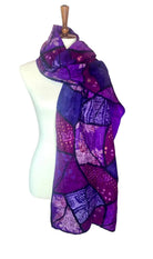 Pomegranate Moon Sari Patchwork scarf in violet, plum and amethyst felted silk patches with dark seams, displayed on a dress form