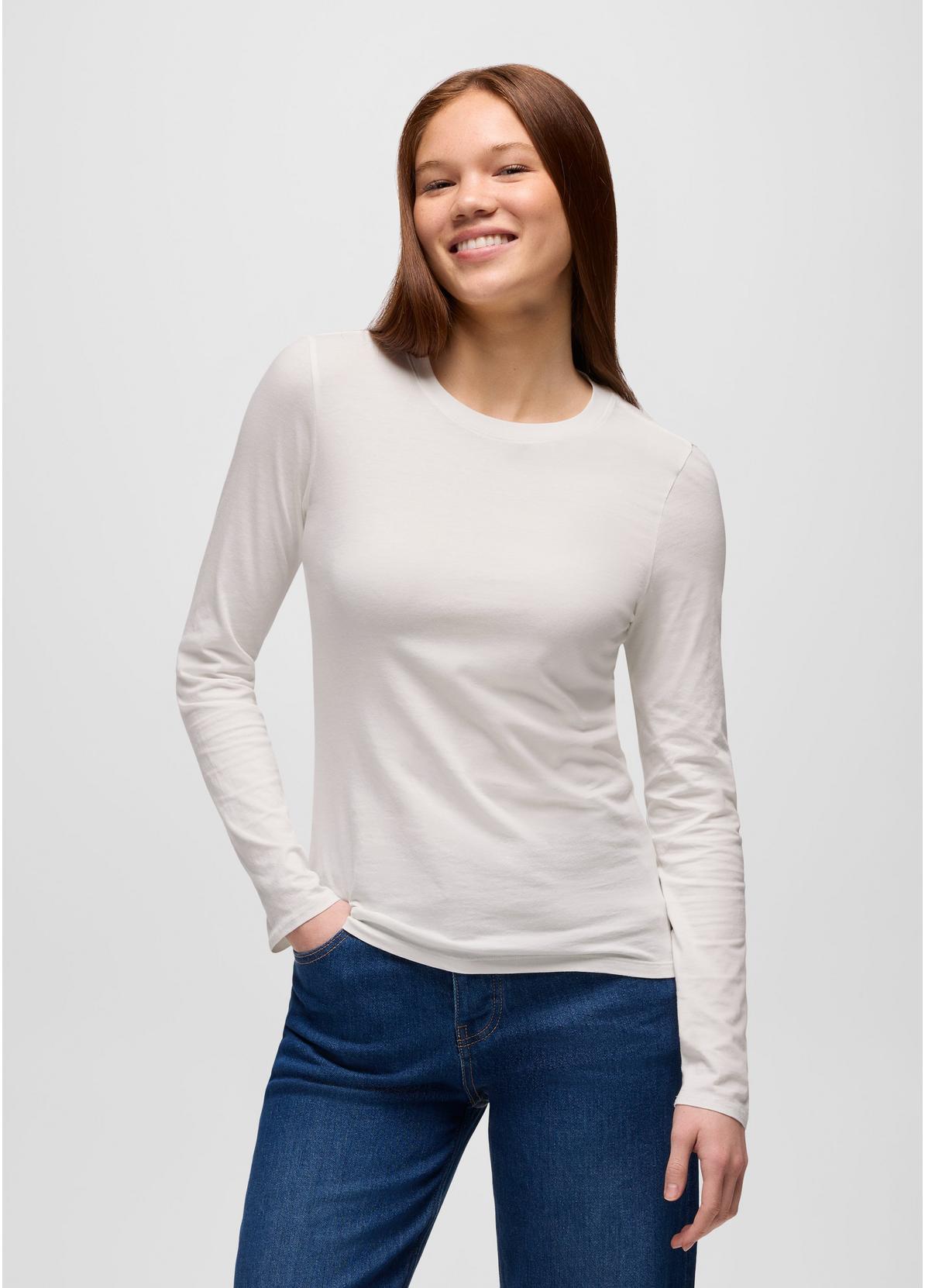 prAna Everyday Long Sleeve Tee in White, slim organic cotton crew neck tee worn with jeans, front view