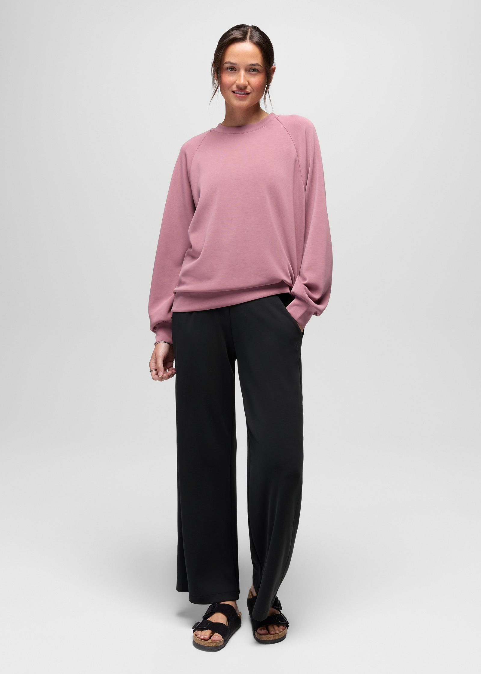 prAna Shea Soft Wide Leg Pant in Black, full-length view styled with a pink sweater