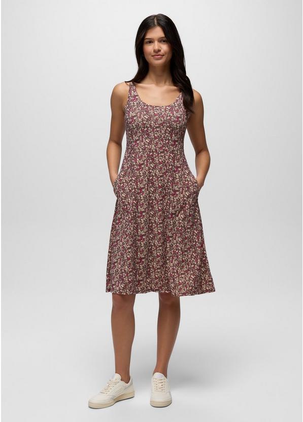 Woman wearing a floral dress on a white background