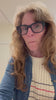 Erica showing off the blue sunwashed shirt from Faherty
