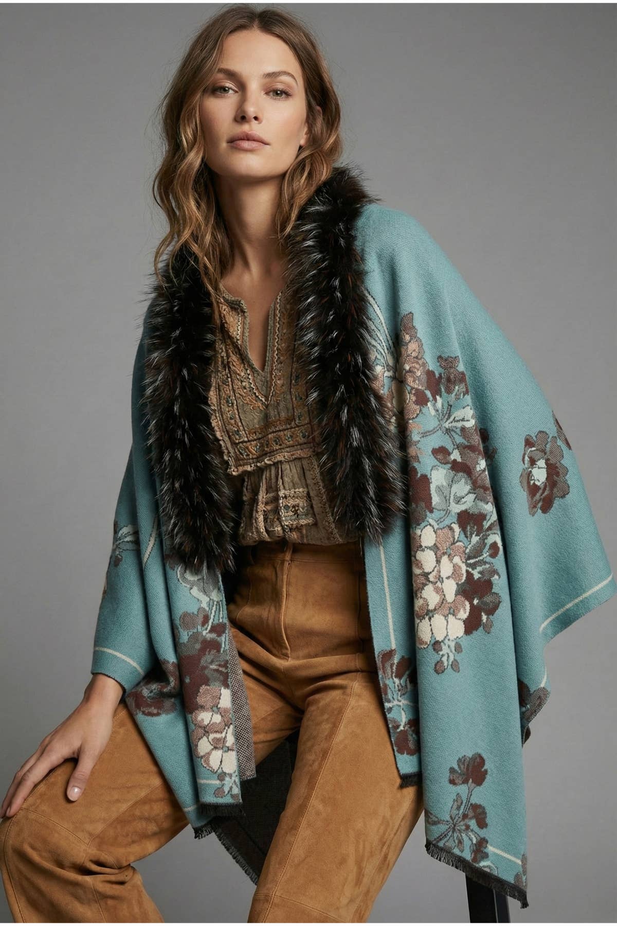 Woman wearing the light blue Bloom reversible fur scarf