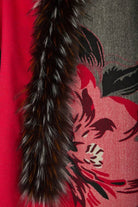 Close-up of the faux fur trim on the red Bloom scarf