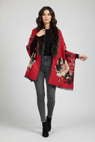 Woman wearing the red Bloom reversible fur scarf