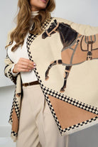 Close-up of the horse and harness print with houndstooth border