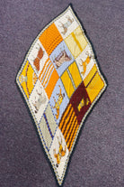 Close-up of the horse prints on the pleated bandana