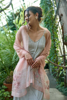 Blush pink sheer scarf laid flat showing the floral embroidery