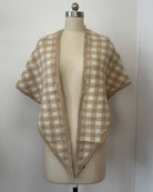 Close-up of the beige gingham knit