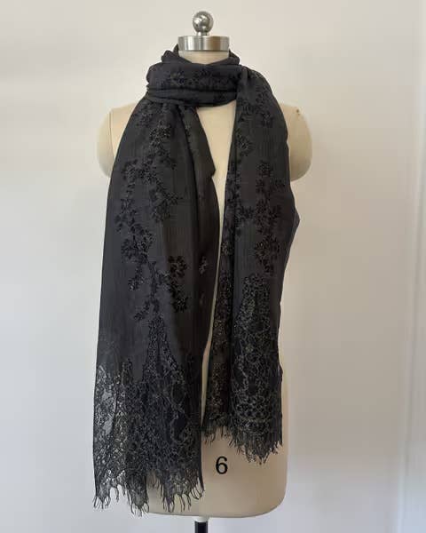 Black lace shimmer scarf laid flat
