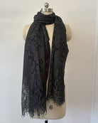 Black lace shimmer scarf laid flat