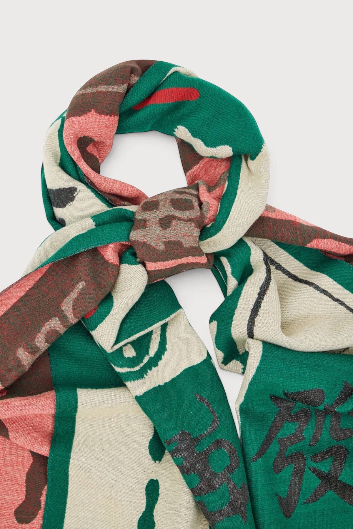 Mahjong reversible scarf knotted at the neck