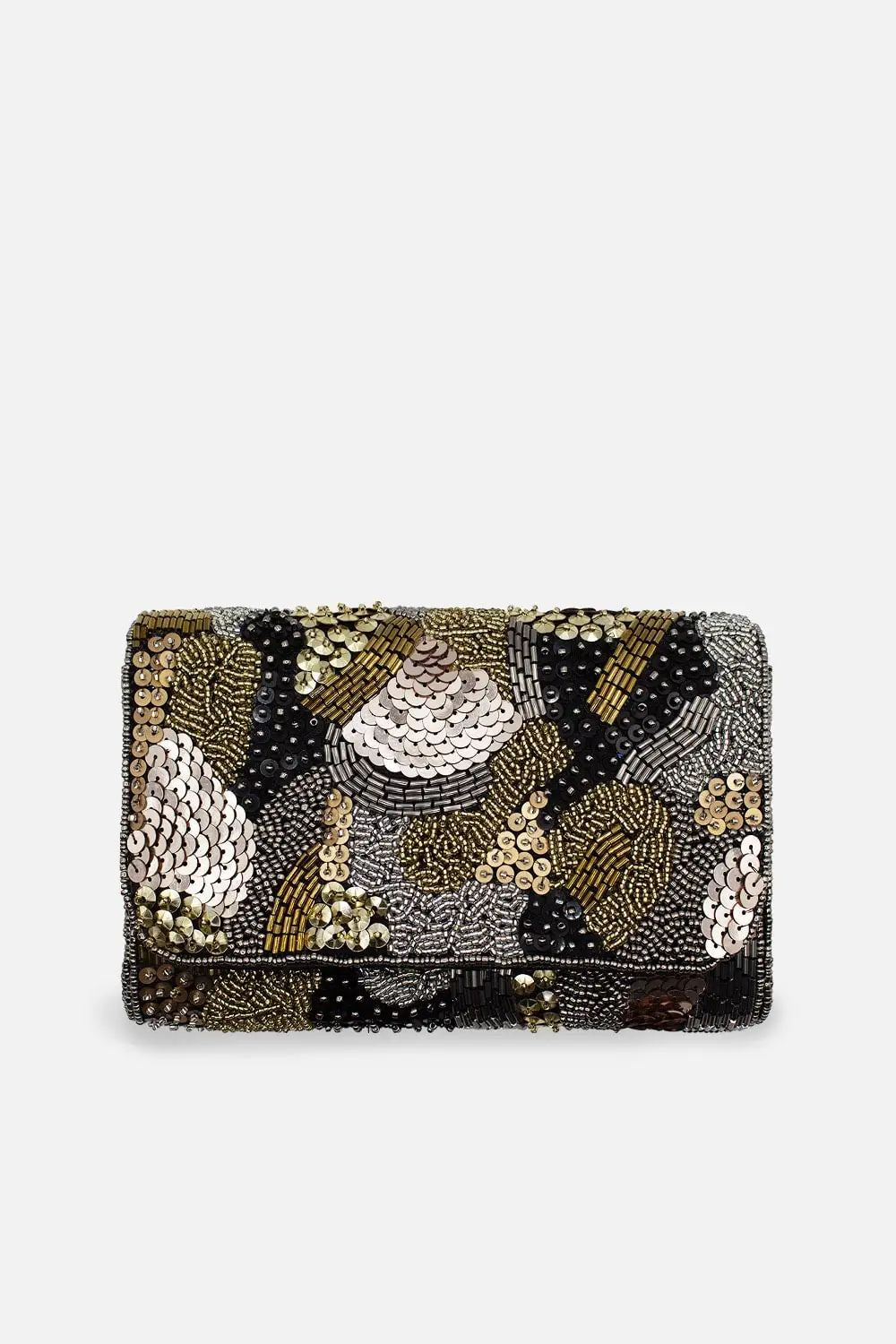 A rectangular clutch bag covered in intricate beadwork and sequin embroidery, featuring a pattern of black, gold, and silver tones, set against a plain light gray background.