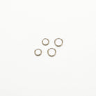 Silver mini huggie hoop earrings, two-pack, on a white background