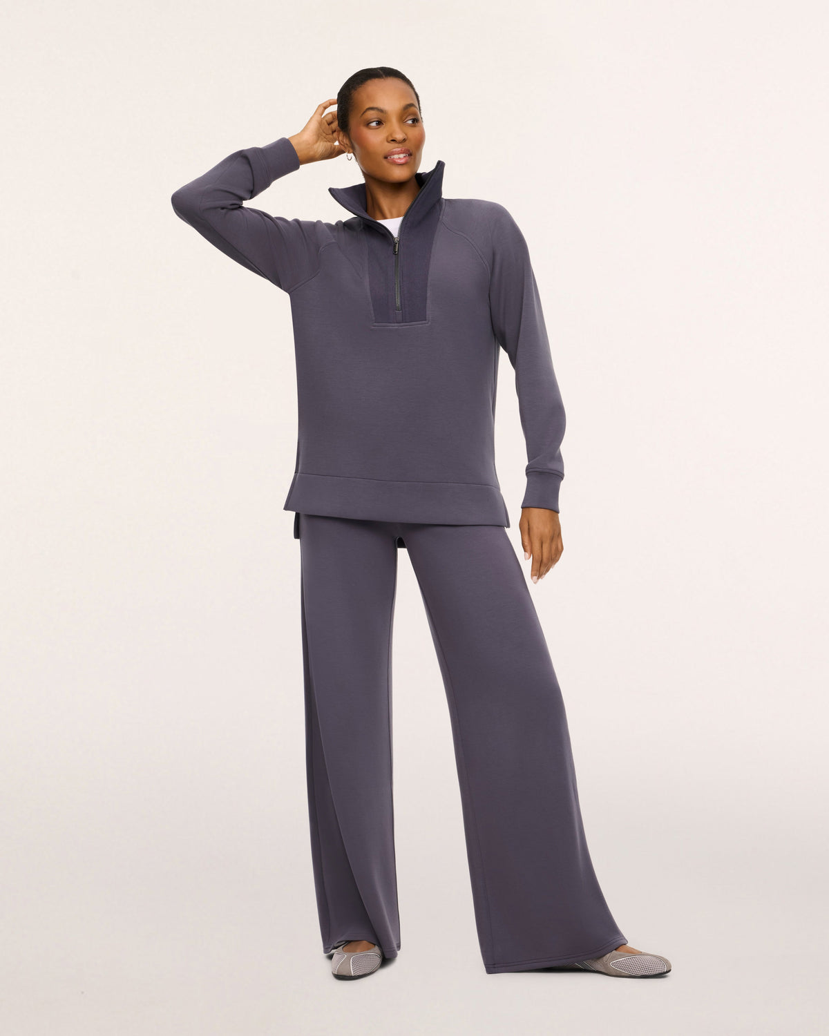 SPANX AirEssentials Wide Leg Pant in Dark Slate gray, full-length view styled with a matching half-zip top