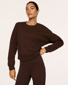 SPANX Cotton Fleece Crewneck in Umber Root brown, front view showing the relaxed, slightly cropped fit
