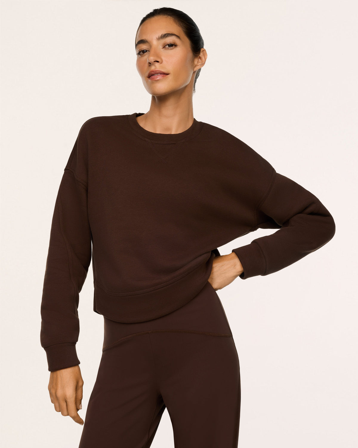 SPANX Cotton Fleece Crewneck in Umber Root brown, front view showing the relaxed, slightly cropped fit