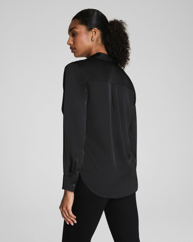 SPANX Silky Smooth Button Down in Classic Black, back view with relaxed drape and shirttail hem