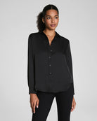 SPANX Silky Smooth Button Down in Classic Black with black pants, traditional collar and button front, front view