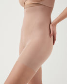 Close-up of SPANXshape Original High-Waisted Footless Sheers in a nude shade at the hip and high waistband