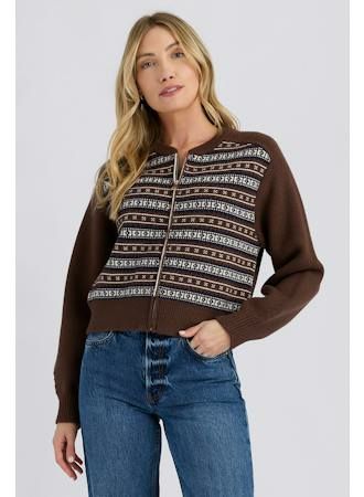 Model wearing the Stitches + Stripes Mael Jacket, zip-front sweater with fair isle stripe front and carob brown sleeves, with jeans