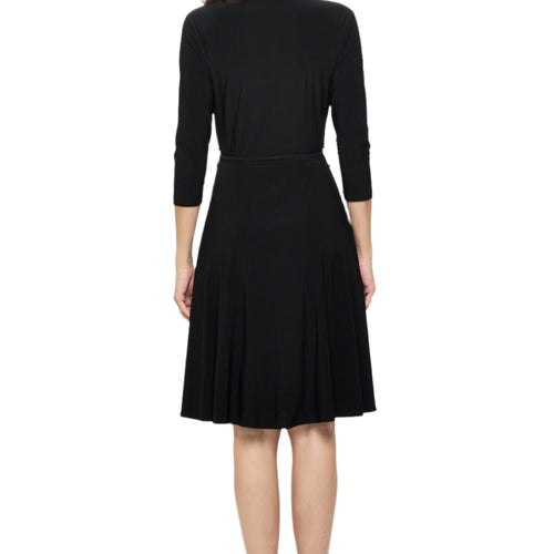 Surplice V-Neck Tie Waist Flowy Dress in Black, back view