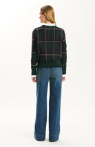 Back view of the Tyler Böe Hailey Novelty Ruffle Sweater in Ponderosa Pine plaid