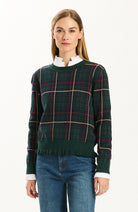 Tyler Böe Hailey Novelty Ruffle Sweater in Ponderosa Pine layered over a white collared shirt