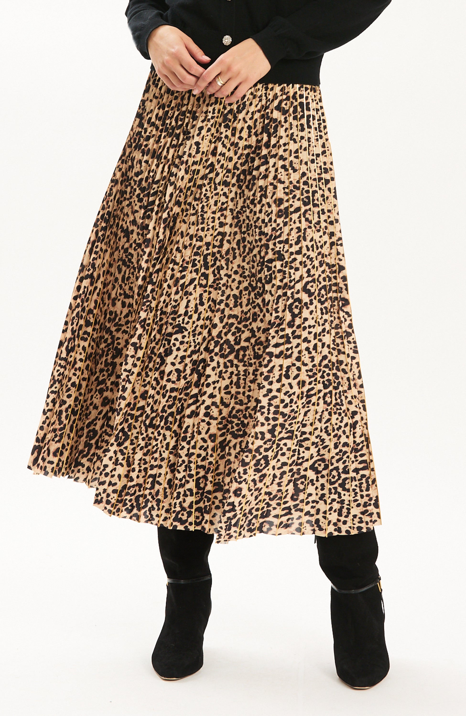 Tyler Böe Pleated Animal Print Midi Skirt worn with black boots, front view