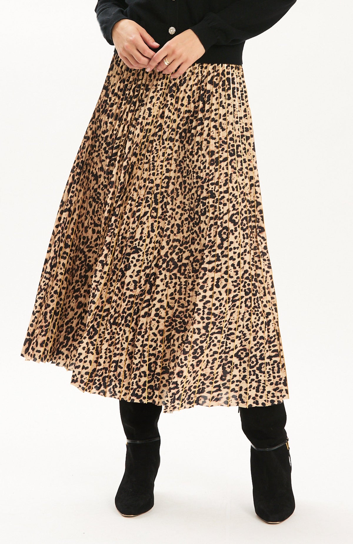 Tyler Böe Pleated Animal Print Midi Skirt worn with black boots, front view