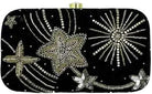 A black velvet evening clutch bag decorated with intricate silver and gold beaded starburst, star, and firework patterns, featuring a small gold clasp at the top.