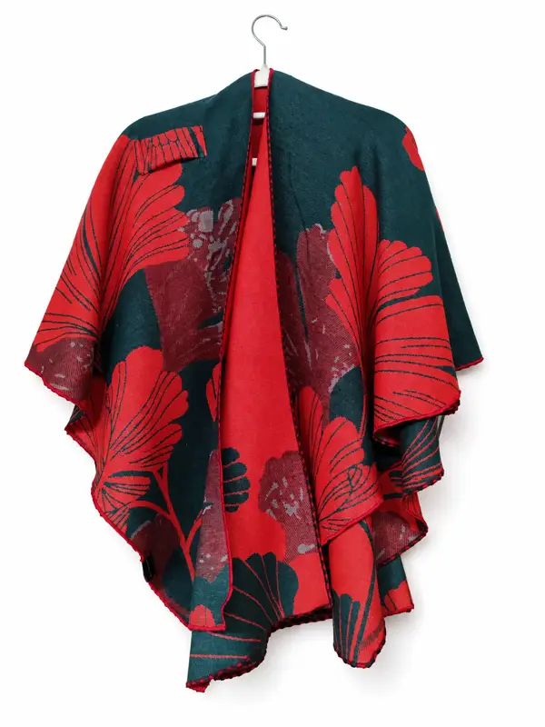 Winding River Large Ginkgoes Reversible Loop Wrap in red and deep evergreen with oversized ginkgo leaf print, shown on a hanger