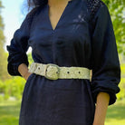 beige wool belt wearing it over a blue dress