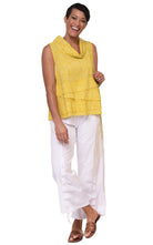 woman wearing yellow top